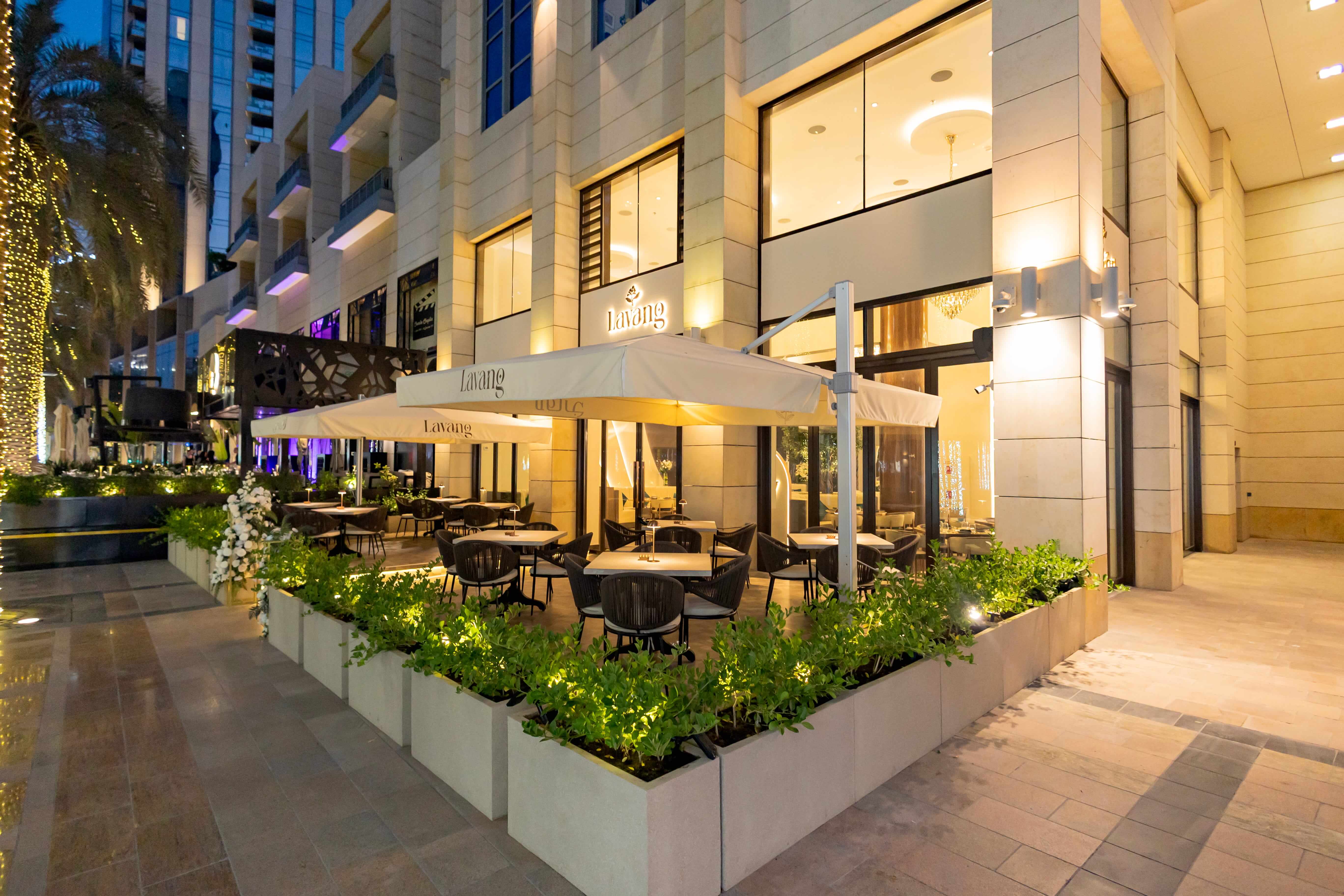 Lavang restaurant entrance with illuminated signage and elegant glass doors
