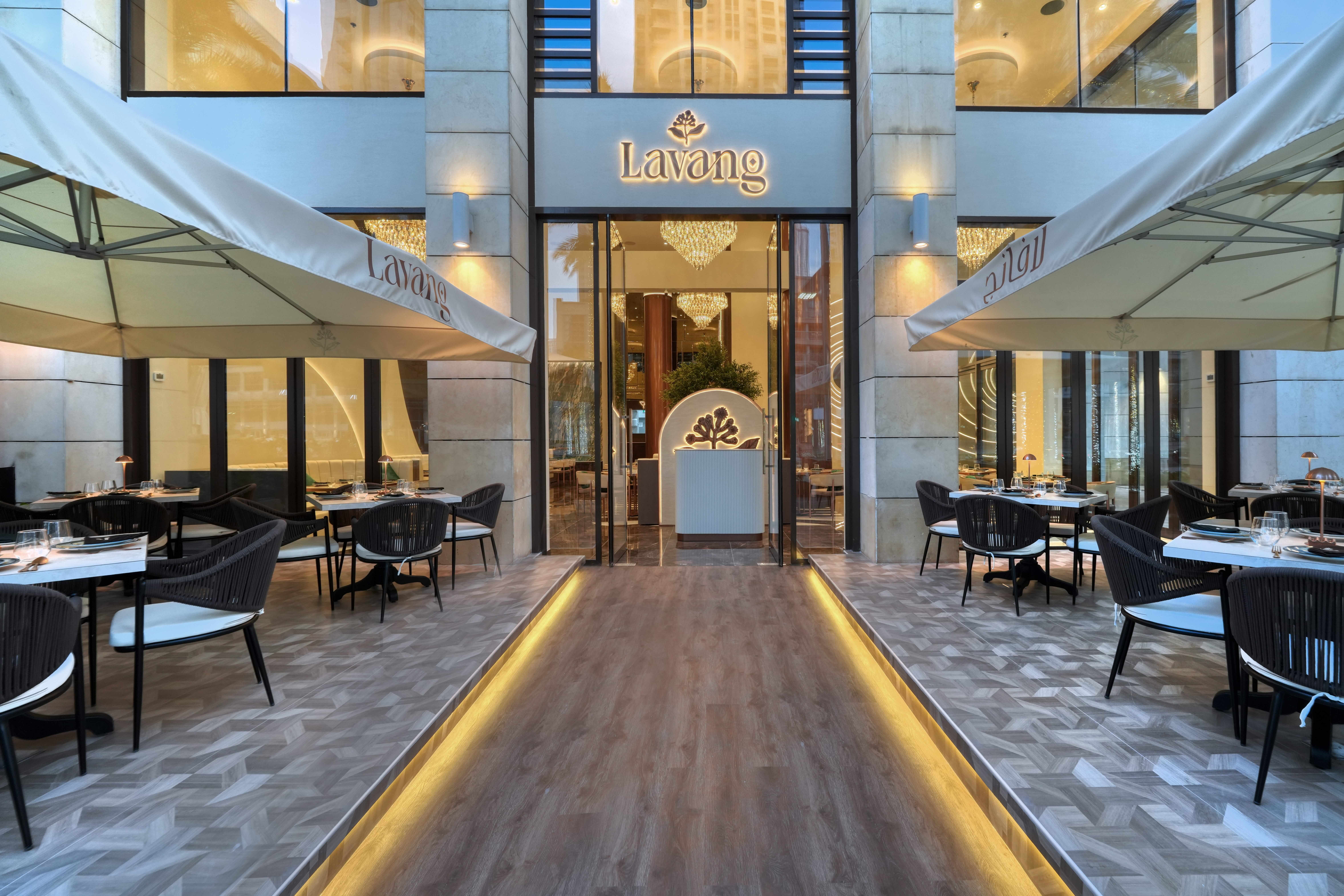 Lavang restaurant outdoor dining area with stylish seating, umbrellas and greenery