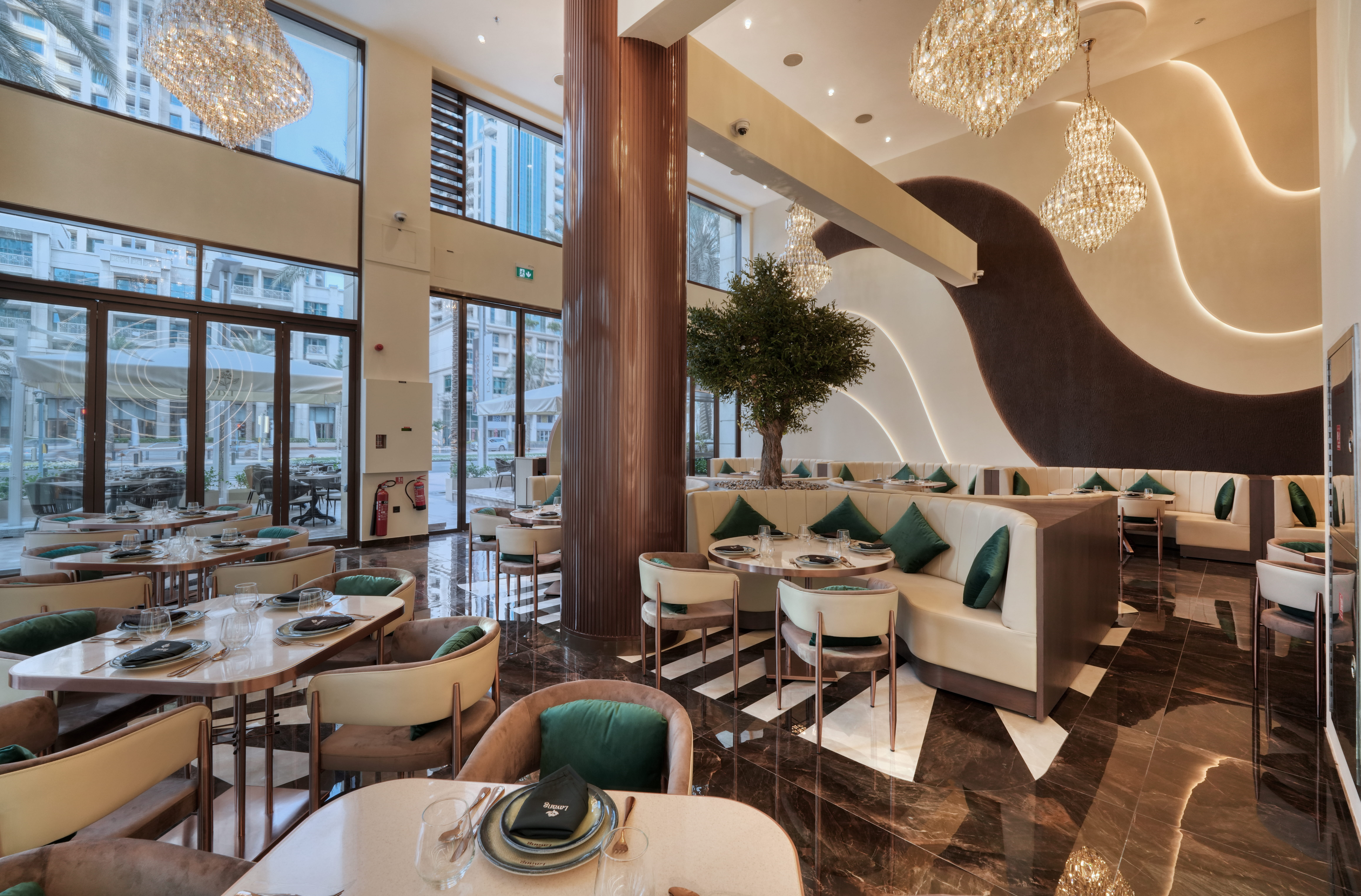 Lavang restaurant interior with luxury seating, chandeliers, marble flooring and decorative lighting